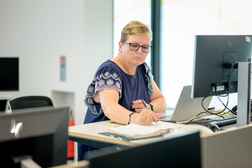 a person sitting at a desk